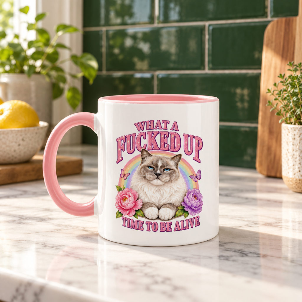 Pink cat mug with vintage ragdoll, roses and rainbow print on a marble kitchen counter – What a Fucked Up Time to Be Alive